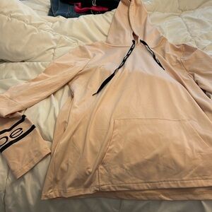 Light pink with Black letters Bebe hoodie.